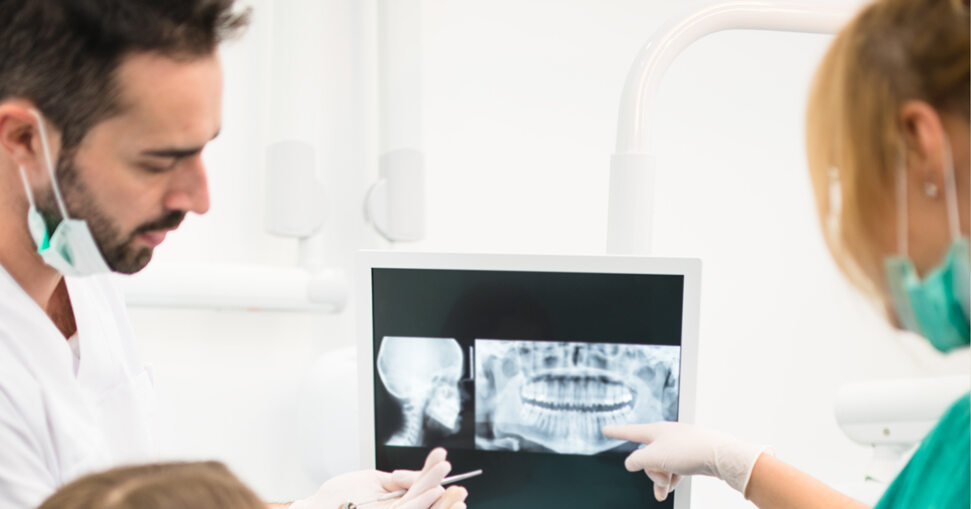 dental practice imaging x-ray doctor client conversation